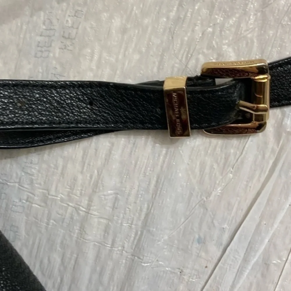 Michael kors black leather buckled saddle flap bag